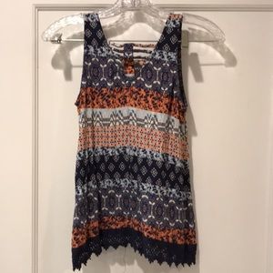 Sleeveless top in beautiful navy and orange color.